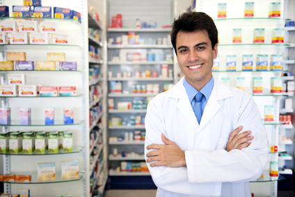 portrait of a male pharmacist at pharmacy